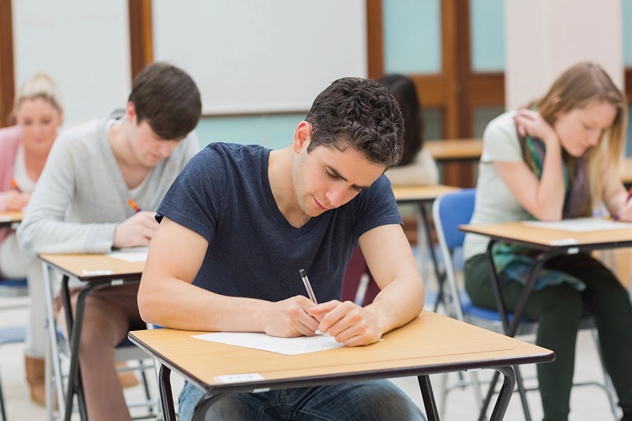 Students taking a test in a classroom in Brooklyn